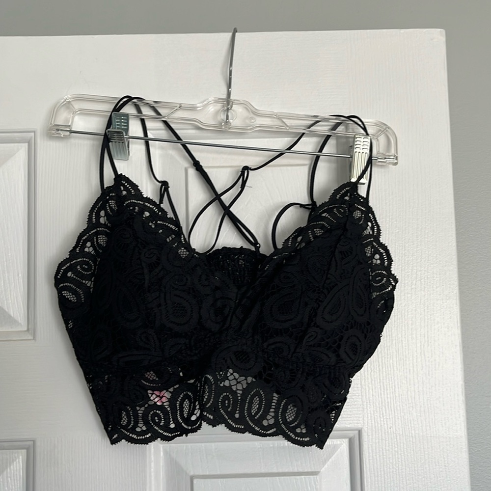 Victoria Secret brand bralette. Black, stretchy and removable pads. Warn 1 time.